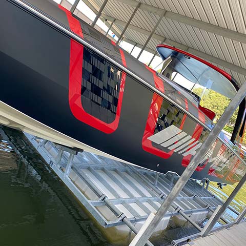 20,000 lb Econo Lift with cigarette boat