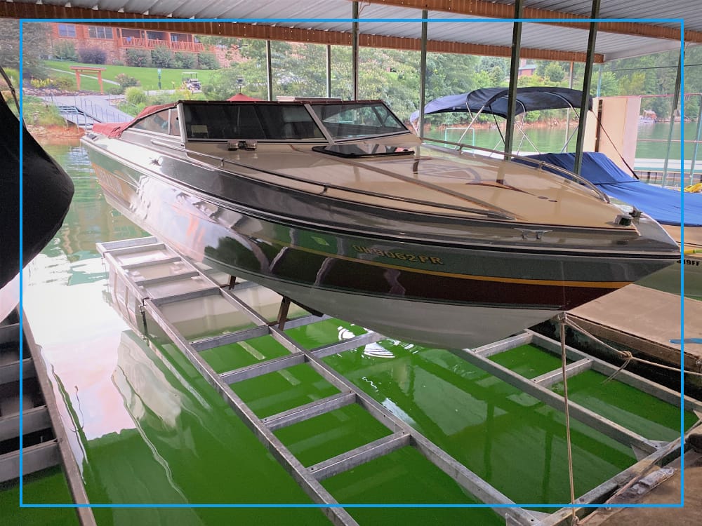 4,500 lb front mount boat lift installed on a dock