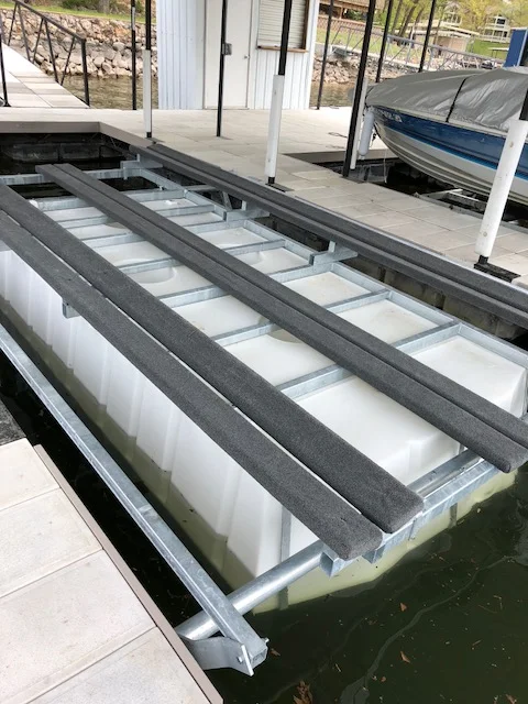 Manitou tritoon raised on an Econo Lift boat lift